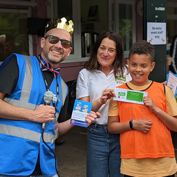 Three people at a fundraising event
